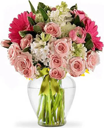 Pink Roses and Gerberas Bouquet with Seasonal filler Flowers. Suitable for occasions like births, love, congratulations, birthdays and friendship.