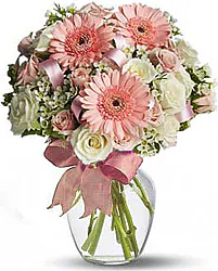Bouquet with Roses, Gerberas and seasonal filler flowers.