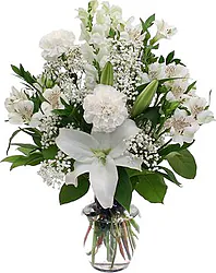 Mazzo funebre di gigli o lilium, alstroemerie, garofani e fiori misti dai toni chiari