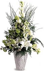 Ciotola funebre di rose, gigli o lilium e fiori misti dai toni chiari