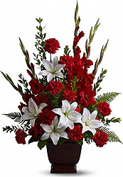 Funeral bowl of red and white lilies and carnations