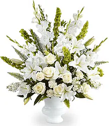 Funeral bunch of delicate roses, lilies, carnations and mixed flowers