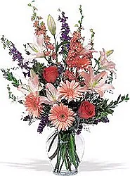 Funeral bunch of pastel roses, lilies, gerberas and mixed flowers