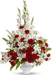 Mazzo funebre di rose, gigli o lilium, garofani e fiori misti dai toni bianchi e rossi