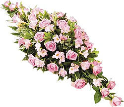 Cuscino funebre di rose e fiori misti dai toni rosa