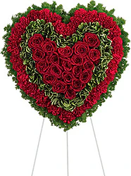Funeral wreath of red roses and carnations