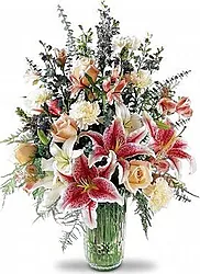 Delicate lilies, roses and mixed flowers