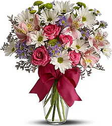 Pastel roses, daisies or gerberas, alstroemerias and mixed flowers