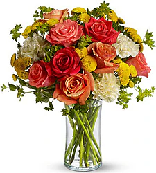 Roses and mixed flowers in warm colors