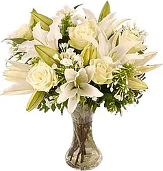 Roses, lilies and mixed flowers in light colors