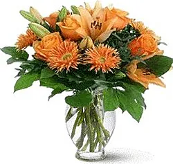 Roses, lilies and mixed flowers in warm colors