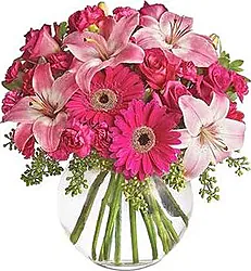 Bouquet with Roses, Lilies, Gerberas and seasonal filler flowers.