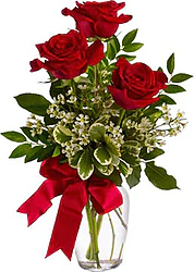 3 highest quality Red Roses with seasonal greenery